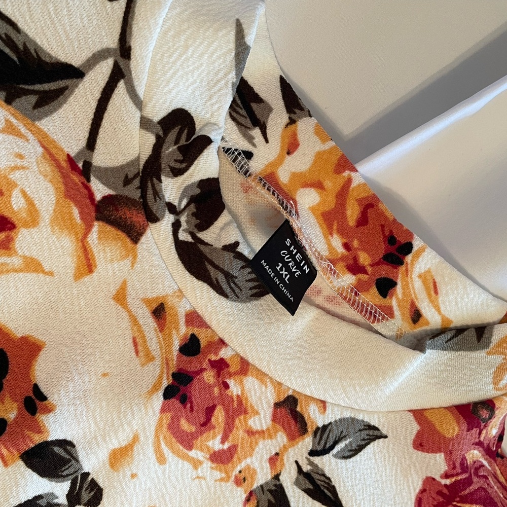 Floral peplum top